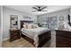 Guest bedroom with a queen-size bed and window seating at 3756 E Lake Dr, Land O Lakes, FL 34639