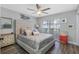 Bright bedroom with a comfortable bed and plenty of natural light at 3756 E Lake Dr, Land O Lakes, FL 34639