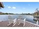 Peaceful dock with rocking chairs overlooking the lake at 3756 E Lake Dr, Land O Lakes, FL 34639