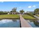 Backyard with dock providing lake access at 3756 E Lake Dr, Land O Lakes, FL 34639