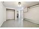 Clean, spacious basement with epoxy flooring and built-in storage at 4233 Oakfield Ave, Holiday, FL 34691