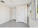 Bright laundry room with vinyl flooring and ample space at 4233 Oakfield Ave, Holiday, FL 34691
