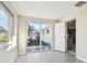 Sunroom with sliding glass doors leading to backyard at 4233 Oakfield Ave, Holiday, FL 34691