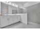 Modern bathroom with double vanity and large walk-in shower at 5225 Caserta Ct, Palmetto, FL 34221
