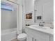 Clean bathroom with bathtub, vanity, and window at 5225 Caserta Ct, Palmetto, FL 34221