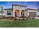 Stunning curb appeal featuring a tile roof and arched entryway at 5225 Caserta Ct, Palmetto, FL 34221
