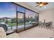 Spacious screened patio overlooking backyard at 5225 Caserta Ct, Palmetto, FL 34221