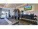 Modern weight room with a variety of dumbbells and machines at 5225 Caserta Ct, Palmetto, FL 34221
