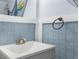 Small bathroom with nautical themed decor at 5401 Circle Dr, Weeki Wachee, FL 34607