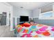 Bedroom with flat screen TV and beach decor at 5401 Circle Dr, Weeki Wachee, FL 34607