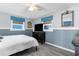 Bright bedroom with a comfortable bed and plenty of natural light at 5401 Circle Dr, Weeki Wachee, FL 34607