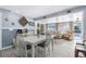 Bright dining area flows into living room at 5401 Circle Dr, Weeki Wachee, FL 34607