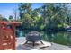 Relaxing dockside fire pit overlooking the water at 5401 Circle Dr, Weeki Wachee, FL 34607