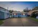 Cute cottage with orange shutters and spacious parking at 5401 Circle Dr, Weeki Wachee, FL 34607