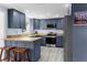Modern kitchen with stainless steel appliances and island at 5401 Circle Dr, Weeki Wachee, FL 34607