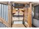 Rustic outdoor shower with wood siding at 5401 Circle Dr, Weeki Wachee, FL 34607