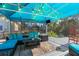 Covered patio overlooking the water with comfy seating at 5401 Circle Dr, Weeki Wachee, FL 34607