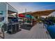 Large waterfront deck with a grill and outdoor seating area at 5401 Circle Dr, Weeki Wachee, FL 34607