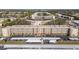 Aerial view showcasing building and ample parking at 5705 80Th St N # 304, St Petersburg, FL 33709