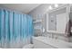 Clean bathroom with white vanity and shower/tub at 5705 80Th St N # 304, St Petersburg, FL 33709