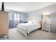 Bedroom with queen bed and coastal decor at 5705 80Th St N # 304, St Petersburg, FL 33709