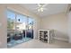 Bright dining area with sliding doors to balcony at 5705 80Th St N # 304, St Petersburg, FL 33709