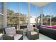 Relaxing screened balcony with outdoor seating at 5705 80Th St N # 304, St Petersburg, FL 33709