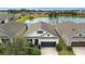 Single-story house next to a lake in a quiet neighborhood at 5725 Stockport St, Riverview, FL 33578