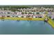 Wide aerial view of houses and lake, showing community at 5725 Stockport St, Riverview, FL 33578