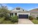Property has a view of a lake and is surrounded by other homes at 5725 Stockport St, Riverview, FL 33578