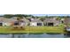 Aerial view of houses and lake, showcasing community at 5725 Stockport St, Riverview, FL 33578
