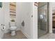 Small bathroom with toilet and walk-in shower at 5725 Stockport St, Riverview, FL 33578
