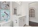 Small bathroom with toilet and white vanity at 5725 Stockport St, Riverview, FL 33578