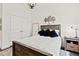 Well-lit bedroom featuring a comfortable bed and ample closet space at 5725 Stockport St, Riverview, FL 33578