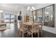 Spacious dining area with a wooden table and view of the backyard at 5725 Stockport St, Riverview, FL 33578