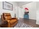 Bright entryway with hardwood floors and a blue cabinet at 5725 Stockport St, Riverview, FL 33578