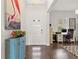 Bright and spacious entryway with hardwood floors and home office at 5725 Stockport St, Riverview, FL 33578