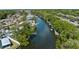 Aerial view of waterfront homes and lush greenery at 5809 Imperial Ky, Tampa, FL 33615