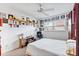 Spacious bedroom with a ceiling fan and large window at 601 N Hercules Ave # 503, Clearwater, FL 33765