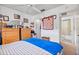 Cozy bedroom with a dresser, closet and bathroom access at 601 N Hercules Ave # 503, Clearwater, FL 33765