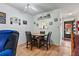 Dining area with wood floor, table and chairs, and access to the kitchen at 601 N Hercules Ave # 503, Clearwater, FL 33765
