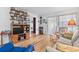 Spacious living room with hardwood floors, comfortable seating, and large windows at 601 N Hercules Ave # 503, Clearwater, FL 33765