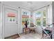 Sunroom with tiled floors, and access to backyard at 601 N Hercules Ave # 503, Clearwater, FL 33765