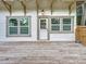 Rear home exterior view, showing access door to deck at 718 34Th S Ave, St Petersburg, FL 33705