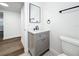 Stylish bathroom with a modern vanity, quartz countertop, and patterned floor tile at 718 34Th S Ave, St Petersburg, FL 33705