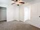 Spacious bedroom with ceiling fan and ample closet space at 718 34Th S Ave, St Petersburg, FL 33705
