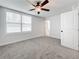 Roomy bedroom with two windows and ceiling fan at 718 34Th S Ave, St Petersburg, FL 33705