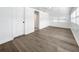 Bright bonus room with hardwood floors and access to hallway and bathroom at 718 34Th S Ave, St Petersburg, FL 33705