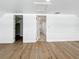 Versatile bonus room with hardwood floors and multiple entry points at 718 34Th S Ave, St Petersburg, FL 33705
