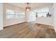 Dining room with hardwood floors and modern light fixture at 718 34Th S Ave, St Petersburg, FL 33705